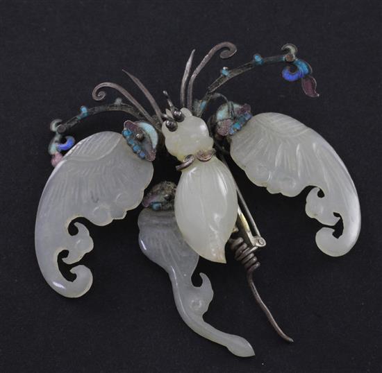 A Chinese pale celadon jade silver and enamelled articulated model of a butterfly, late 19th / early 20th century, width 7.5cm